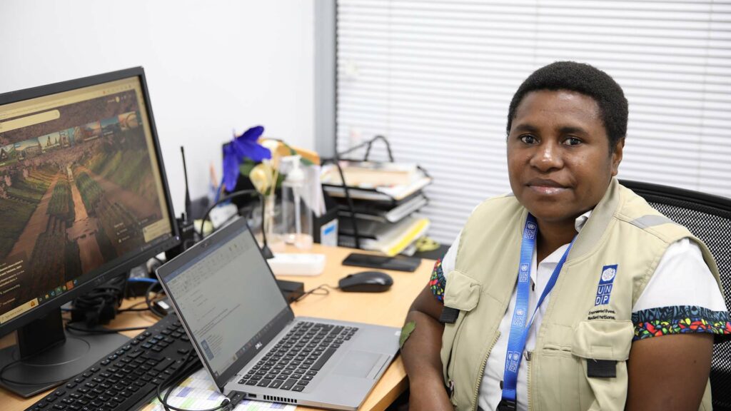 Jenny Wakfen at her office desk in Papua New Guinea